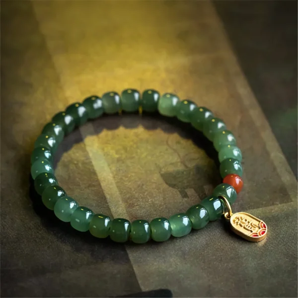Hetian Jade Buddha Bead Bracelet with Red Agate
